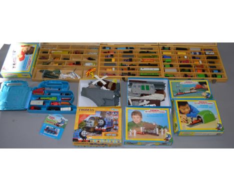 Four cases containing a good quantity of  unboxed, playworn, mainly ERTL Thomas the Tank Engine diecast models together with 