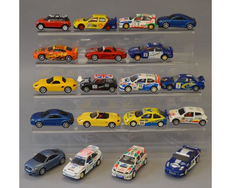 Nineteen unboxed Scalextric slot cars including Renault, Boxster, Mini and Subaru models, some with slight damage and several