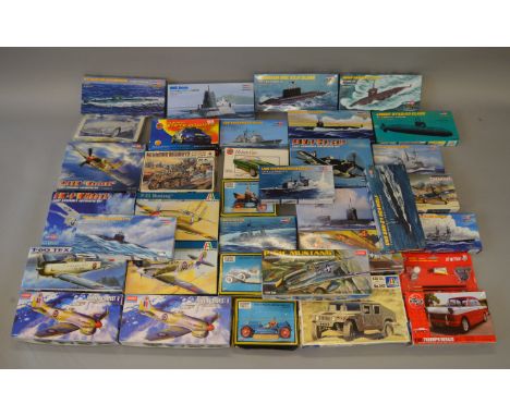 Thirty four model kits, in a variety of different scales, by Academy, Italeri, Hobby Boss and others and subjects include air