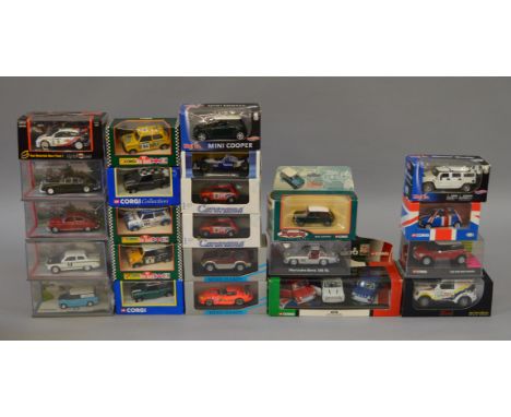 Twenty three boxed diecast model cars in 1:36 and 1:43 scale by Corgi, Minichamps, Schuco and others including the Corgi 0550