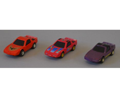 Three unboxed Scalextric Pontiac Firebird slot cars, all different includes one from the M.A.S.K. set. Overall appear G. (3)