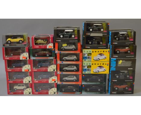 A quantity of boxed diecast model cars from the 'Vanguards' series in 1:43 scale together with  Corgi models of the New  Mini