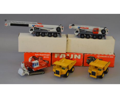 Five boxed 1:50 scale diecast model Crane Vehicles, two Conrad Faun Crane Trucks and two GAMA Faun K100 Dumper Trucks togethe