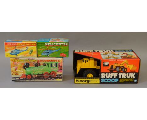 Two Marx plastic battery operated remote control Helicopters and a battery operated 'Clang Clang Locomotive', also by Marx, t