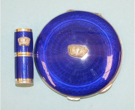 An engine-turned silver and enamel round compact with blue guilloche enamel and naval crown, Birmingham 1946, 7.5cm and a sim