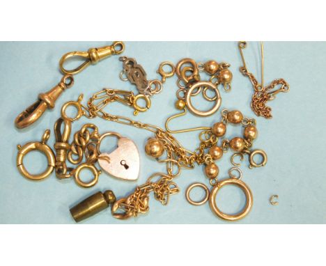 A quantity of gold and yellow metal shackles, ring bolts, links and other items, 17g approximately.