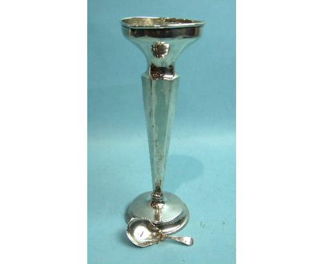 A tall loaded spill vase, London 1923 and a late Victorian caddy spoon, London 1892, (2).