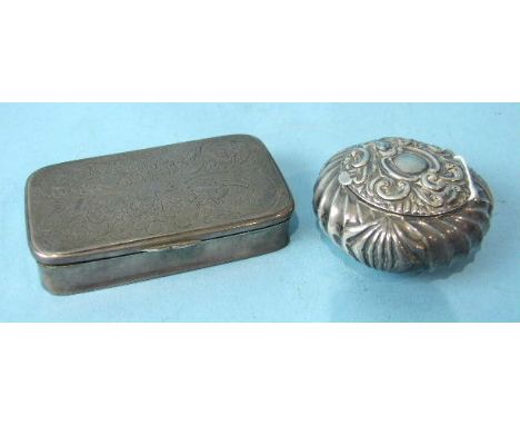 A Continental white metal snuff box with engraved lid and gilt interior, 9cm long and an English embossed silver pill box, Bi