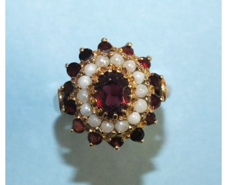 A garnet and pearl cluster ring with 9ct gold mount, size M, 4.9g.