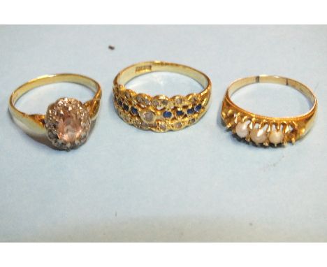 A middle eastern yellow gold ring set blue and white stones, size N and two other gem set 18ct gold rings (one with vacant se
