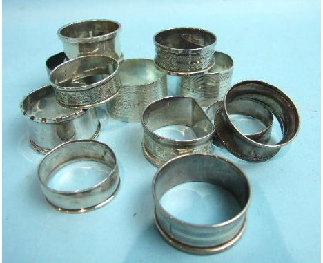 A pair of engine turned silver napkin rings and nine others, (11),___6oz.