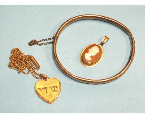 A 9ct gold heart pendant on chain, 4.9g, a small 9ct-gold-mounted cameo pendant and a 9ct gold hinged bangle, (damaged), 5g.