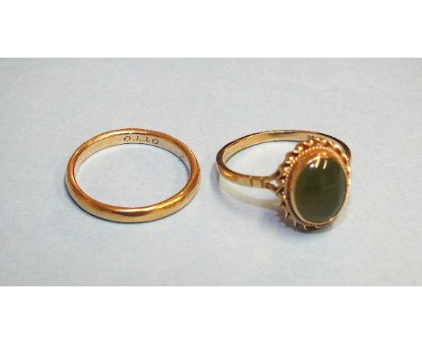 A 9ct gold ring set jade, size N, 2.1g and a 9ct gold wedding band, size L, 1.9g, (2).