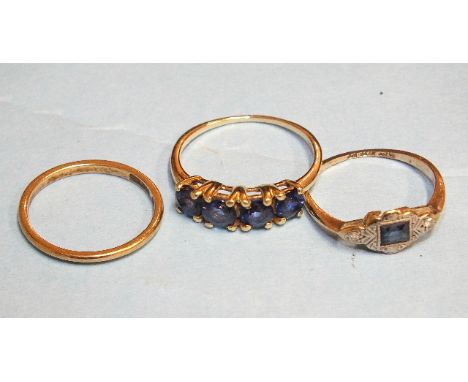 A 9ct gold ring set four synthetic sapphires, size P½ and two 9ct gold rings, one set sapphire and diamonds, 4.6g, (3).