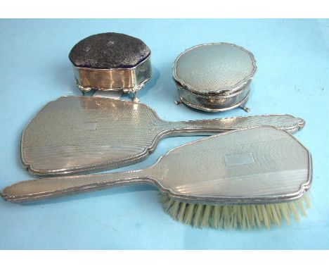 An engine turned silver backed dressing table mirror, brush and circular jewellery box, Birmingham 1961 and other dressing ta