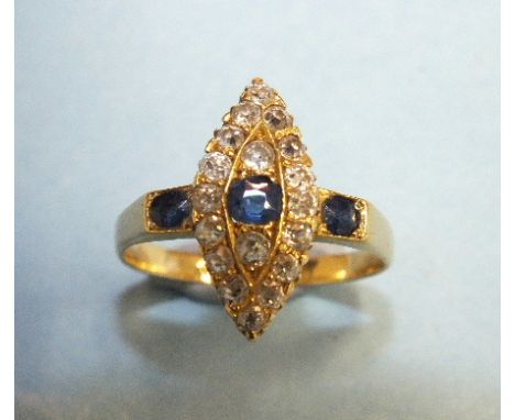 A sapphire and diamond marquise cluster ring set old brilliant cut diamonds around a round cut sapphire, between sapphire set