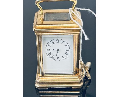 Miniature brass 4 glass carriage clock & key
