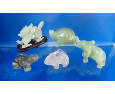 A COLLECTION OF CARVED 'JADE' ANIMALS and two similar frogs (5)