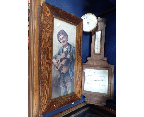 A 1930S OAK CASED BAROMETER, a brass cased barometer (examine) and a pair of Vintage framed prints