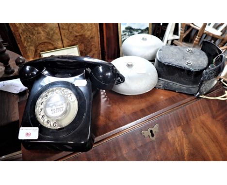 A VINTAGE BLACK DIAL TELEPHONE and an alarm bell