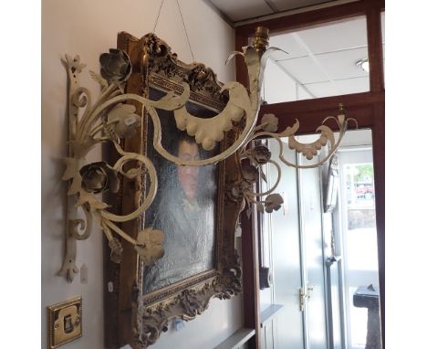 A PAIR OF ROCOCCO STYLE WROUGHT IRON LAMP BRACKETS of scrolling form, 54cm x 54cm 