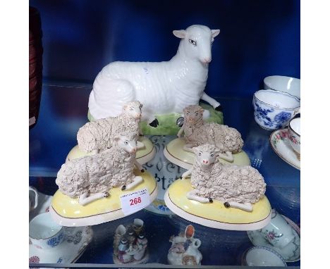 FOUR 19TH CENTURY STAFFORDSHIRE SHEEP and a later ceramic sheep (5)