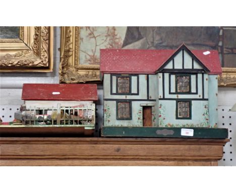 A VINTAGE WOODEN TOY FARM YARD, a similar dolls house and continental toy wooden buildings 