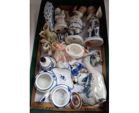 A COLLECTION OF CERAMIC ORNAMENTS INCLUDING A WADE DOG