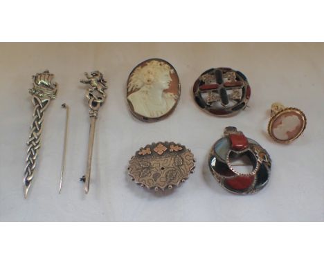 A CARVED CAMEO BROOCH in Silver Mount, a gold and Cameo ring, Scottish hardstone brooches, Dirk pins and other items