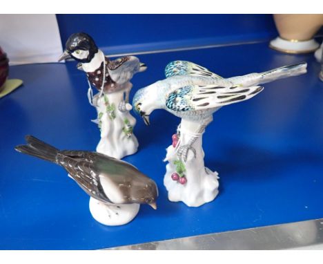 A PAIR OF 19TH CENTURY CONTINENTAL CERAMIC BIRDS and one other (3)
