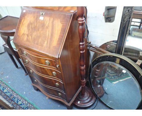 A REPRODUCTION MAHOGANY BUREAU of small proportions, 54cms wide, a demi lune table, lamp and other small furniture as lotted