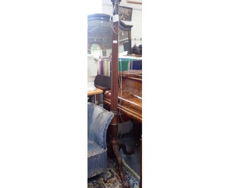 A GEORGE III STYLE STANDARD LAMP with tripod base and ball and claw feet