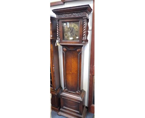 A 1920S OAK CASED GRANDMOTHER CLOCK with brass dial and three train movement, 166cm high 