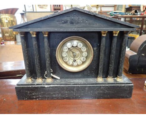 AN EDWARDIAN SLATE CASED MANTEL CLOCK