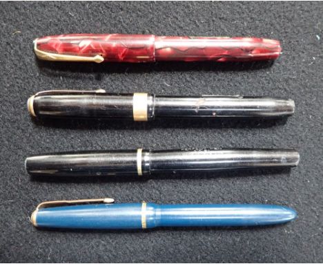 VINTAGE MARBLED CONWAY STUART FOUNTAIN PEN WITH GOLD NIB and three other pens