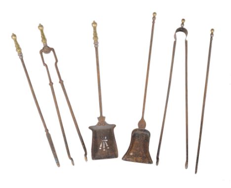 A set of three steel and brass mounted fire tools  , 19th century, comprising shovel, poker and tongs, with knopped grips, 6