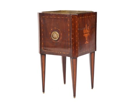  A Dutch mahogany and marquetry inlaid jardiniere  , first half 19th century, of square section, with a metal liner and four 