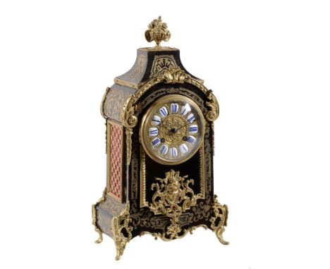 Ω A Napoleon III gilt metal mounted Boulle mantel clock , circa 1870, the eight-day bell striking movement stamped L CHARVET 