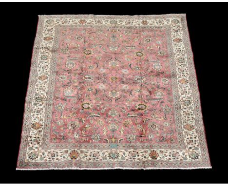  A Tabriz carpet  , approximately 303cm x 390cm 