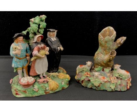 An 18/19th century Staffordshire/Derbyshire Pearlware figure group, Tithe Pig, showing the Tithe between The Church and Farme