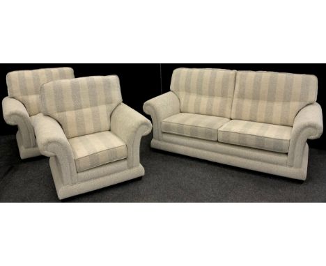 A contemporary scroll arm three seat sofa, 101cm high x 203cm wide x 92cm deep, and a conforming pair of armchairs, (3). 