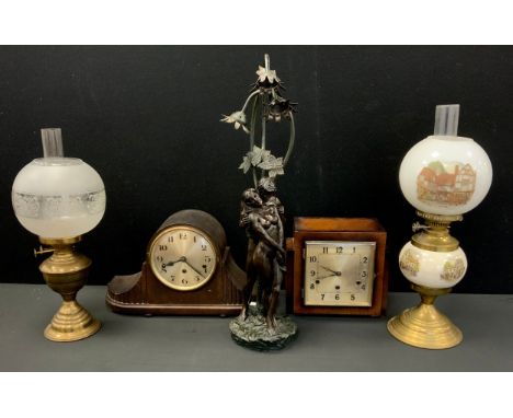 An Art Deco style figural table lamp base, (unwired), the Lovers, 66cm high,  two oil lamps, one with etched globular shade ;