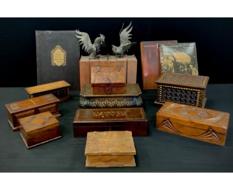 A rectangular carved and studded wooden jewellery box;  others, inlaid with acorns and branches,  sloping topped etc,  pair o