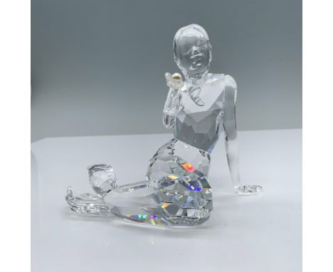 Enchanting clear crystal figure holding a light cream rose pearl. Swarovski swan mark. 827603. This item has its original box