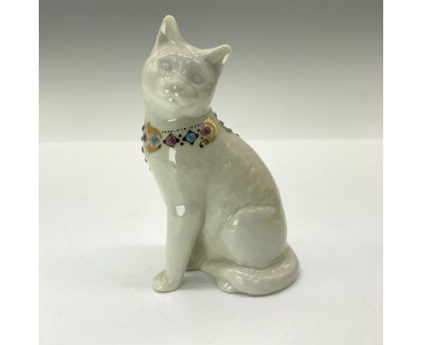 A regal white cat standing gracefully on all fours, its tail elegantly curled inwards, adorned with a collar featuring gilded