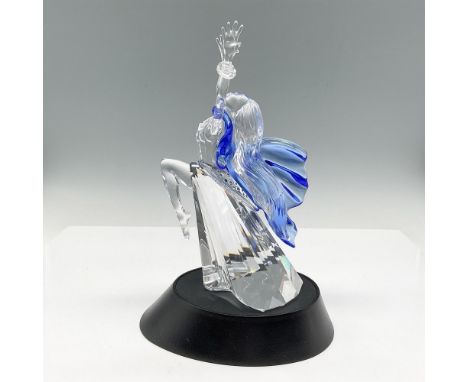 Spectacular clear crystal figure, celebrating the Magic of Dance. A blue scarf around her neck flows to the back. Blue crysta