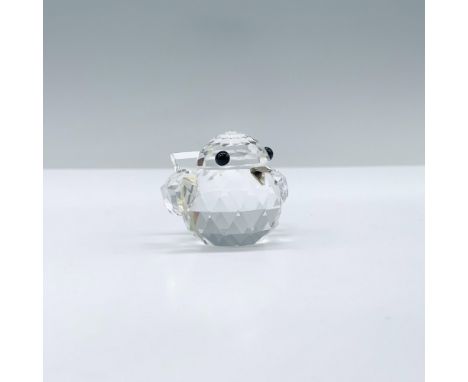 A stunning clear crystal baby sparrow with its wings spread behind its back, adorned with black crystal eyes and a rhodium be