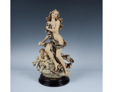 Limited edition. Handcrafted sculpture representing the zodiac sign Gemini. This elegant piece features a woman gracefully ad