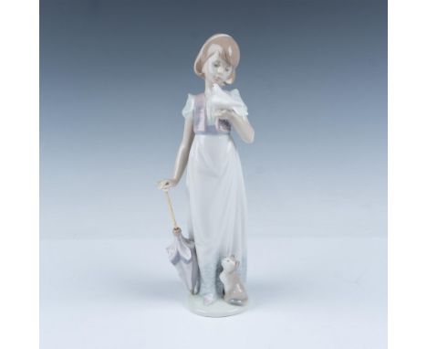 The Collectors Society figure from 1991. Glossy finished short-haired girl gazing at a dove resting on her hand. She holds an