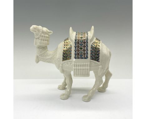 Celebrate the blessed birth of the Savior with this elegant camel sculpture, a magnificent addition to the Lenox China Jewels